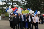 увеличить