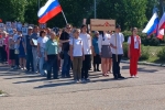 увеличить